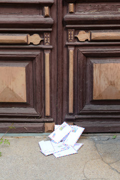 Letters on floor at front door