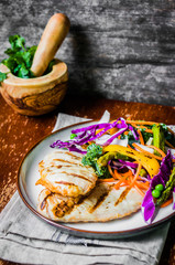 Grilled chicken breasts with vegetables
