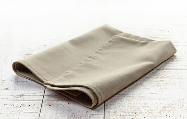 linen napkin on wooden table