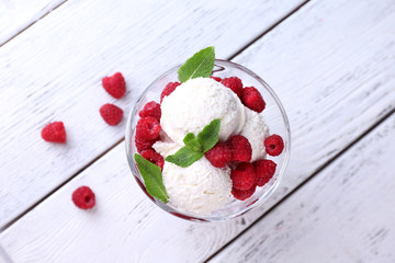 Creamy ice cream with raspberries