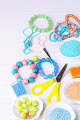 Materials for manufacture of jewelry on table close-up