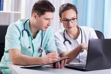 Doctors meeting in office
