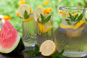 Cold lemonade with ice and mint