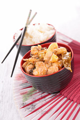 spicy chicken and bowl of rice