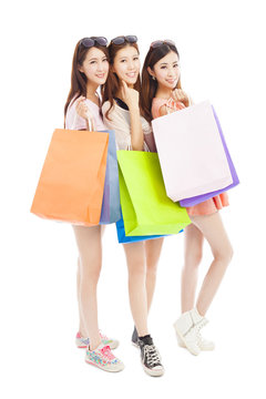three happy asian shopping woman with bags