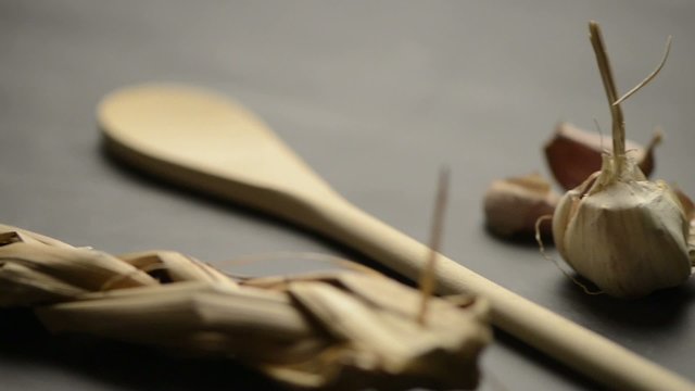 Wooden spoon and garlic 