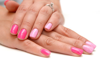 pink manicure isolated on white background