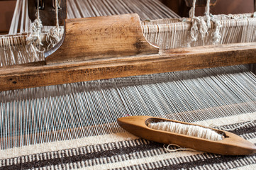 Hungarian traditional homespun. Traditional weaving hand-loom for carpets in Transylvania. - 67907266