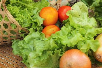 Vegetables salad and tomato in the basket