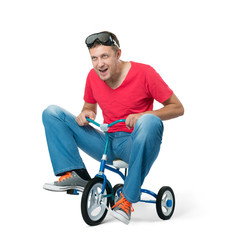 The curious man on a children's bicycle, on white background