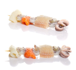 Raw seefood shashlik. Octopus salmon perch etc