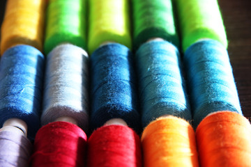 Multicolor sewing threads background