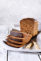 Fresh bread on wooden table, close up
