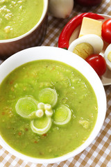 Leek soup on table, close up