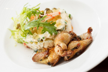 Russian salad with quail