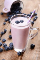 Delicious dessert with blueberries on table close-up