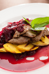 meat with mango and cherry sauce