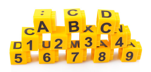 Educational cubes with different numbers and letters isolated