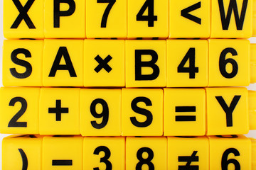 Educational cubes with different numbers and letters, close up