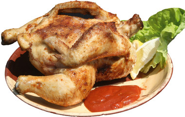 Whole Barbecued chicken grilled on barbecue