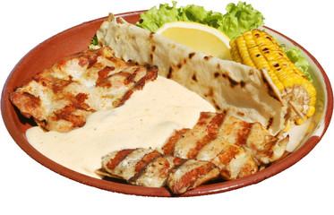 Grilled chicken fillets with sauce and mexican tortillas