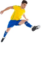 Football player in yellow jumping