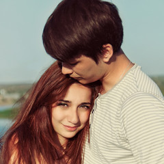 summer outdoors portrait of young sensual couple