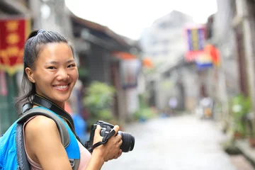 Foto auf Leinwand woman photographer taking photo in guilin,china  © lzf