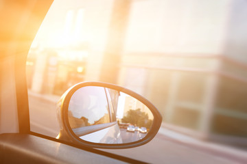 Dynamic view from car on the wing mirror during drive