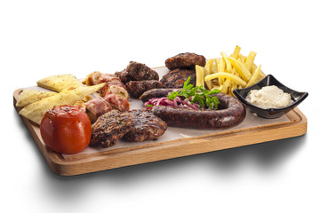 Wholesome platter of mixed meats including grilled steak