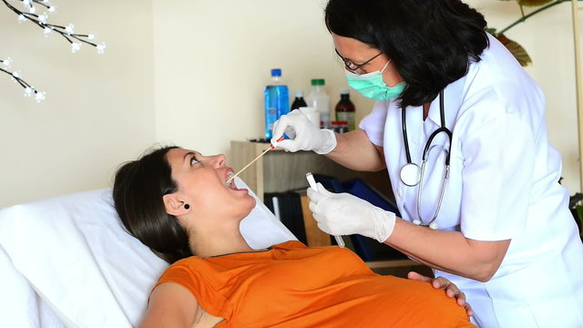Doctor Testing Biological Specimen