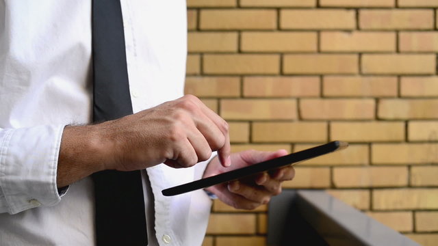 Businessman holding digital tablet computer
