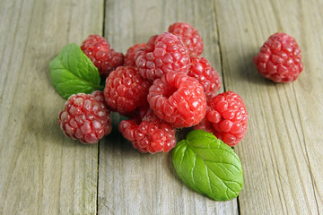 raspberries on wooden background