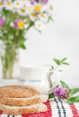 Fototapeta na wymiar Homemade bread and milk in ceramic mug