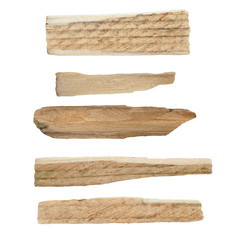 Collection pieces of broken planks of beech isolated on white