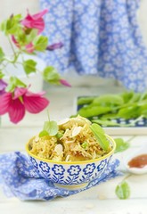 pilaf with chicken, peas and almonds
