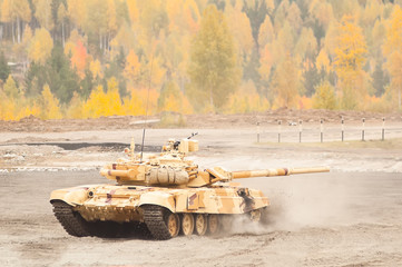 Tank T-90S moves with turret turned back