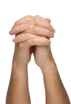 Two praying hands isolated on white background
