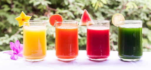 Fruit and vegetable juice on white
