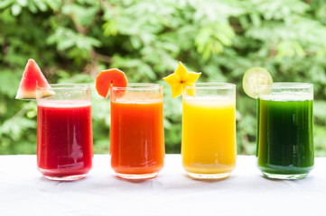 Fruit and vegetable juice on white