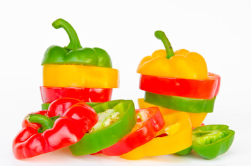 A selection of colorful bell peppers sliced in pieces to make on
