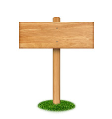 Wooden sign on grass isolated on white background