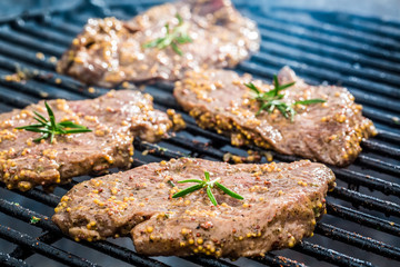 Fresh steak on the grill with fire
