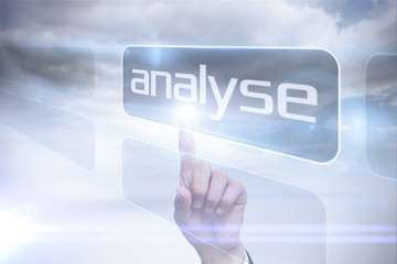 Businessman pointing to word analyse