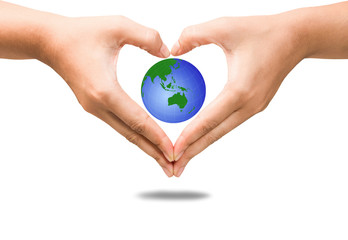 Woman holding globe on her hands.