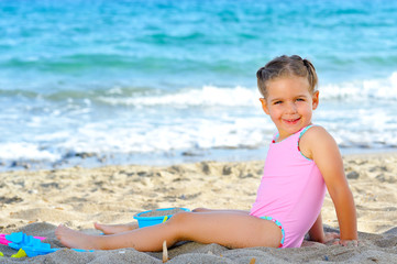 Toddler girl at beach