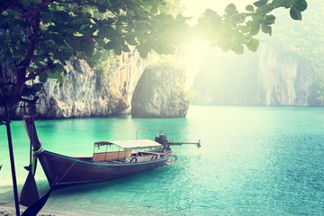 Naklejka na ściany i meble long boat on island in Thailand