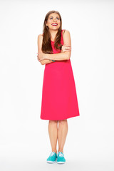 Fashion photo of young model in red dress.