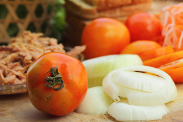 making tuna sandwich with fresh vegetables