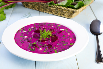Soup with fresh beets served cold with cream